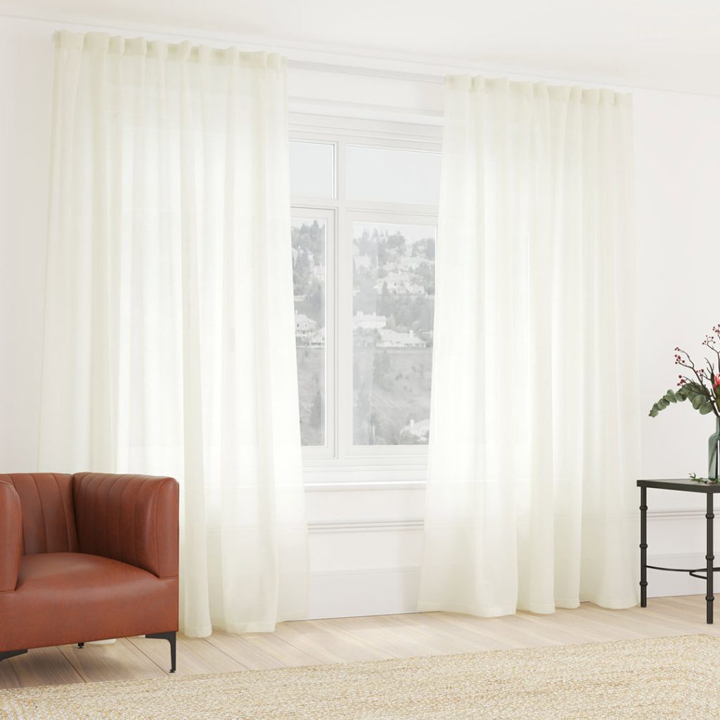 Metro Lifestyle’s Plain Voile Curtain – Sheer white fabric, 290cm x 250cm, softly filtering natural light in a modern living room.