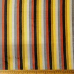 Mongolian Print Twin Stripe Yellow fabric with a vibrant yellow color and bold twin stripes, ideal for creating modern, stylish garments and home décor.