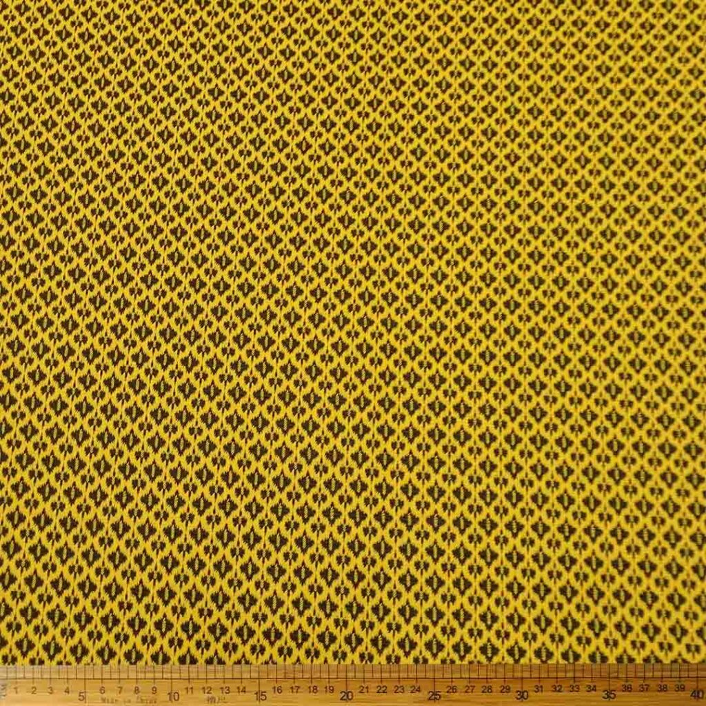 Knitted Jacquard Ethnic Mustard 13512 fabric with a detailed ethnic pattern in mustard, ideal for fashion and home decor projects.