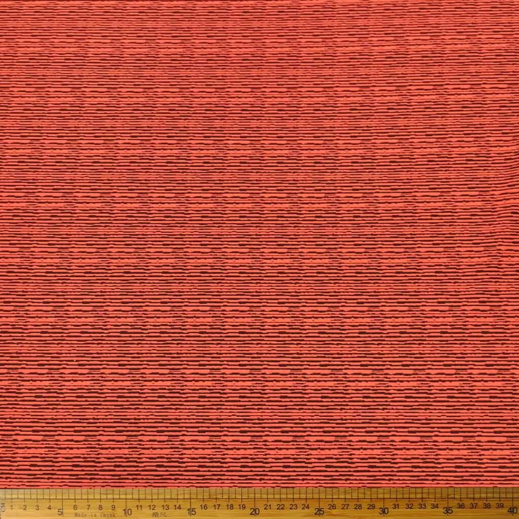 Knitted Jacquard Ethnic Salmon 13513, featuring a vibrant salmon color and intricate ethnic jacquard design, ideal for fashion and home decor projects.
